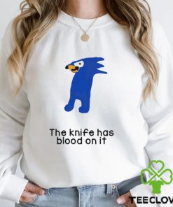 The knife has blood on it shirt