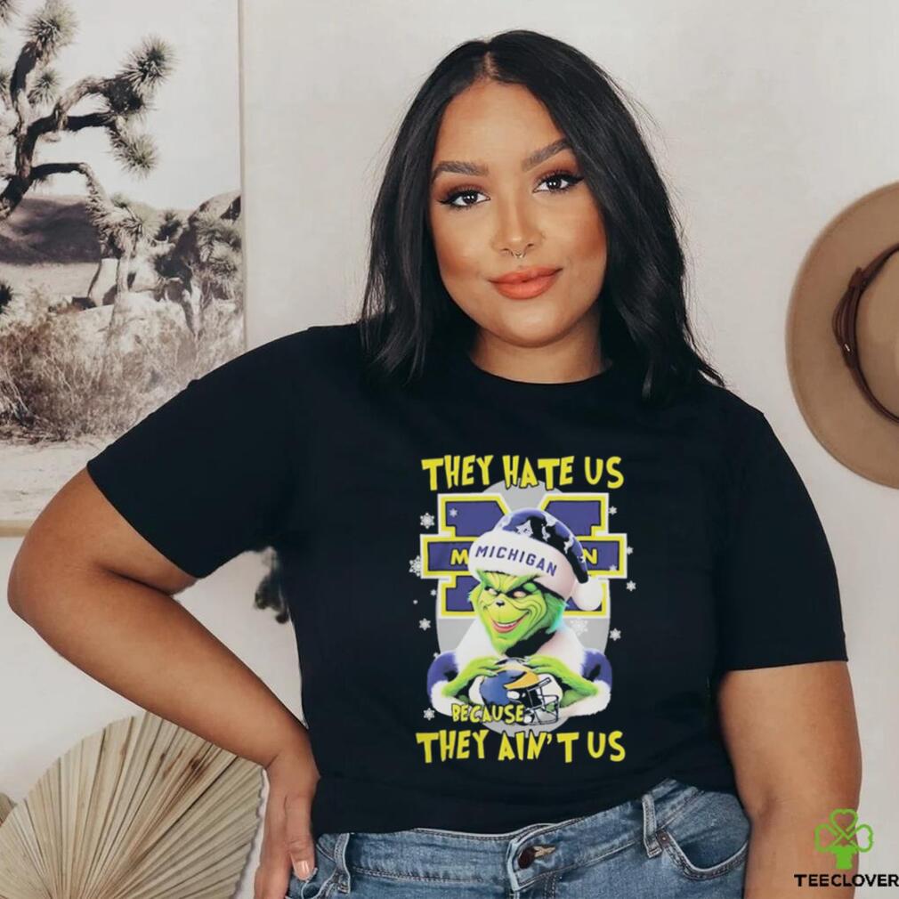 They Hate Us Because Ain’t Us The Grinch Hand Love Michigan Wolverines Christmas Shirt They Hate Us Because Ain’t Us The Grinch Hand Love Michigan Wolverines Christmas Shirt