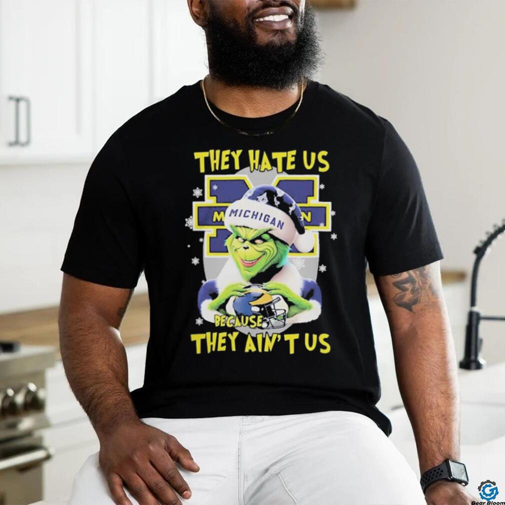 They Hate Us Because Ain’t Us The Grinch Hand Love Michigan Wolverines Christmas Shirt They Hate Us Because Ain’t Us The Grinch Hand Love Michigan Wolverines Christmas Shirt