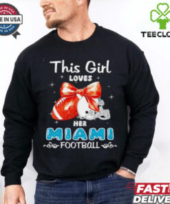 This girl loves her Miami Dolphins Football faux glitter shirt