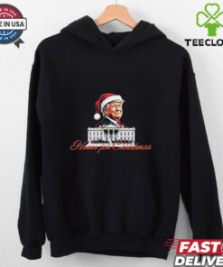 Trump Santa Home For Christmas T-shirts featuring a festive design with Donald Trump dressed as Santa, spreading holiday cheer and celebrating the season.