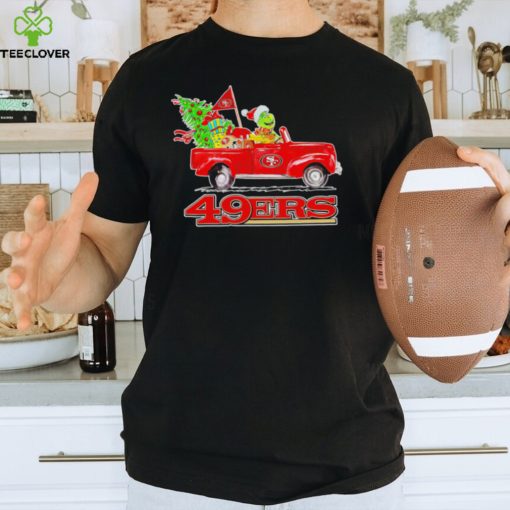 Happy Merry Christmas The Grinch drive a car San Francisco 49ers football logo flag gift hoodie, sweater, longsleeve, shirt v-neck, t-shirt