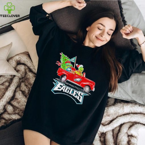 Happy Merry Christmas The Grinch drive a car Philadelphia Eagles football logo flag gift hoodie, sweater, longsleeve, shirt v-neck, t-shirt