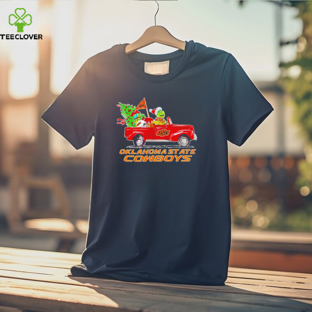 Happy Merry Christmas The Grinch drive a car Oklahoma State Cowboys football logo flag gift shirt Happy Merry Christmas The Grinch drive a car Oklahoma State Cowboys football logo flag gift shirt