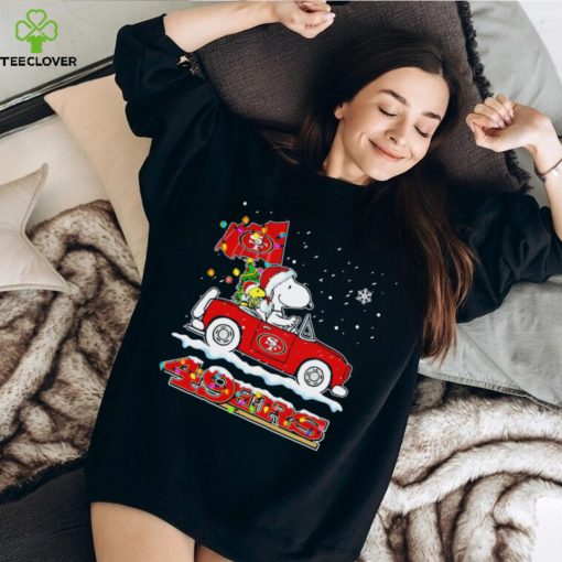 Happy Merry Christmas Snoopy drive a car San Francisco 49ers logo flag gift hoodie, sweater, longsleeve, shirt v-neck, t-shirt