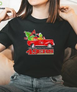 Happy Merry Christmas The Grinch drive a car San Francisco 49ers football logo flag gift hoodie, sweater, longsleeve, shirt v-neck, t-shirt