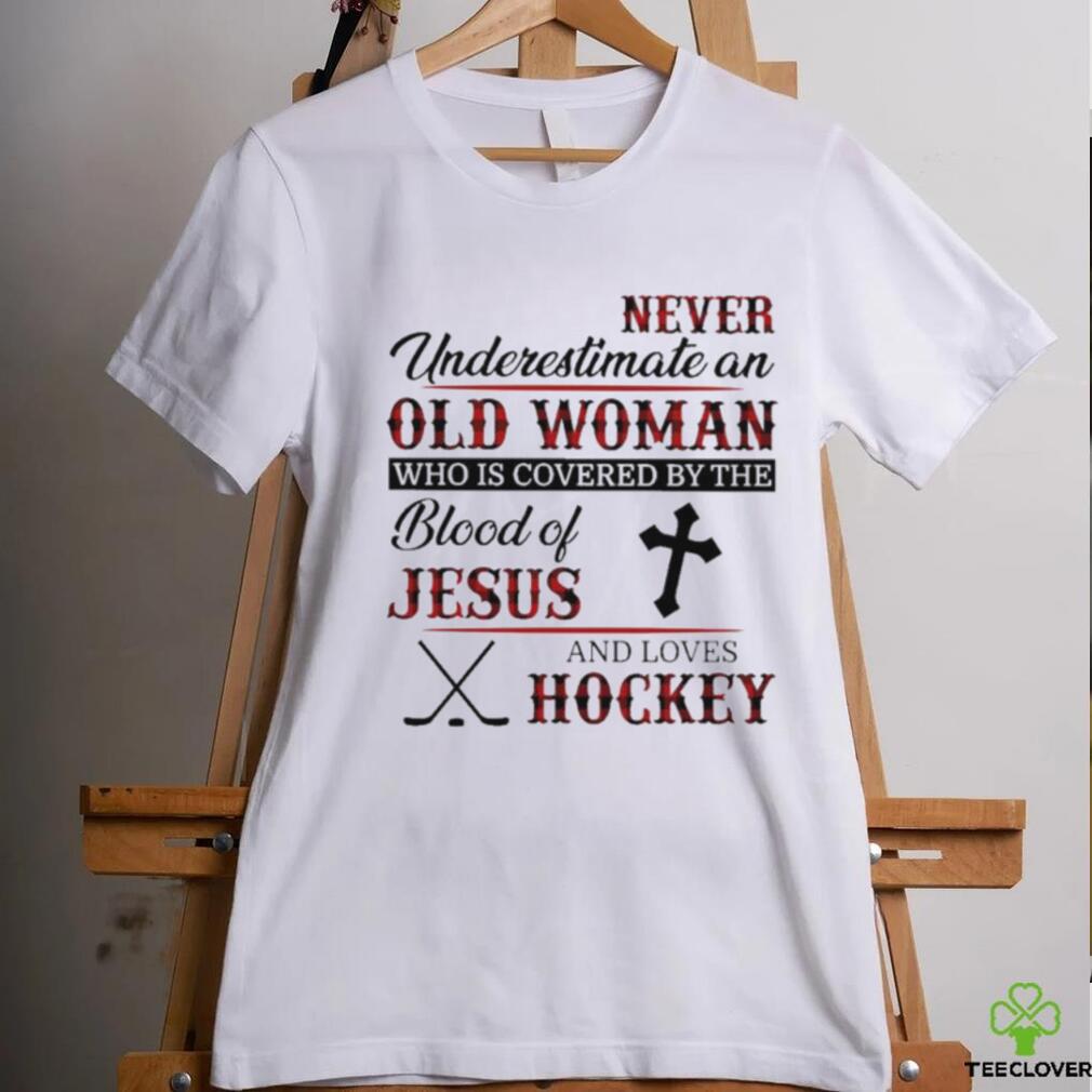 Never underestimate an old woman who is covered by the blood of jesus and loves hockey shirt