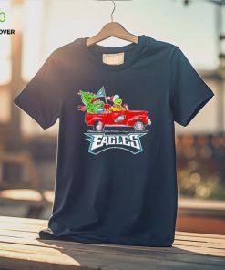 Happy Merry Christmas The Grinch drive a car Philadelphia Eagles football logo flag gift hoodie, sweater, longsleeve, shirt v-neck, t-shirt